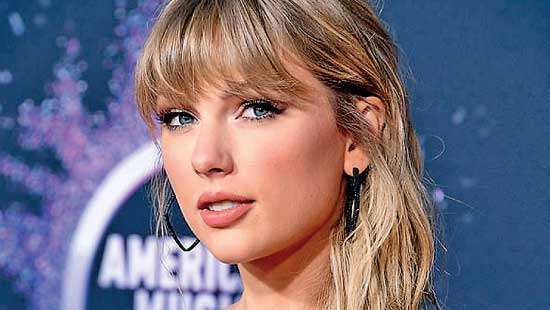 Taylor Swift ties Whitney Houston’s all-time record
