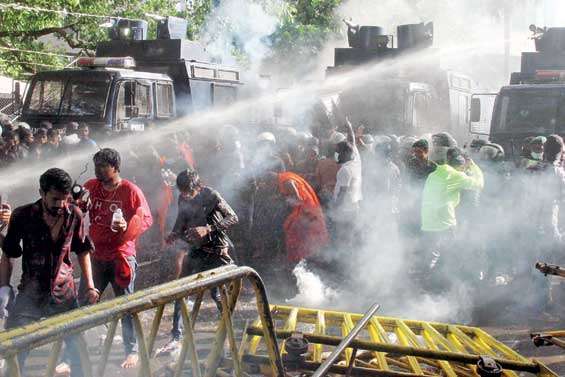 Police use tear gas and water cannons to disperse IUSF protesters