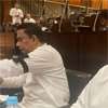 Opposition MPs wear black bands over prison clash