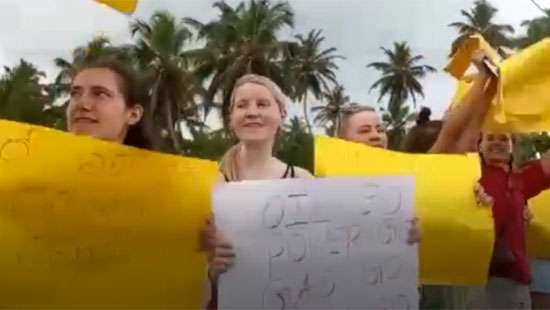 Tourists stage protest in Ambalangoda