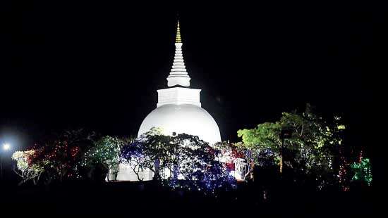 Illumination of the historic Thanthirimale sacred area Lankadeepa Aloka Pooja commences on Poson Poya day for the 18th time