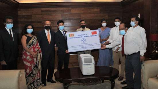 CHEC Port City donates PCR machine