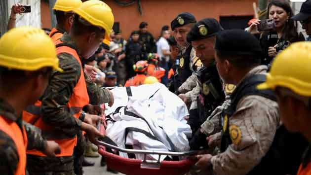 At least 50 die in Guatemala after bus plunges off bridge