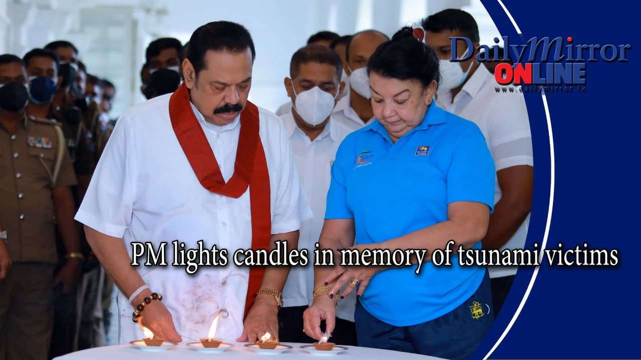 PM lights oil lamps  in memory of tsunami victims