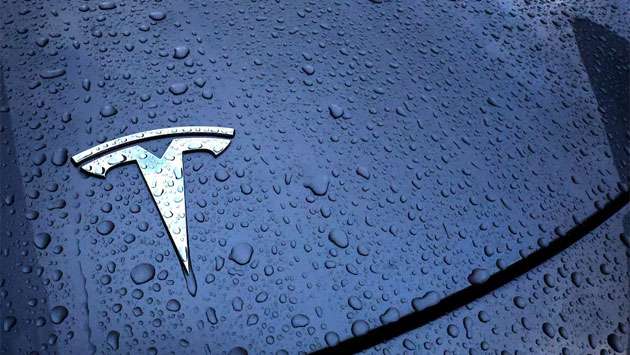 Tesla is developing a new smaller, cheaper EV, sources say.
