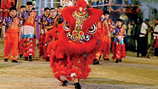 SINGAPORE’S METTA SCHOOL TROUPE BRINGS  TRADITIONAL LION DANCE TO Gangaramaya  Perahera