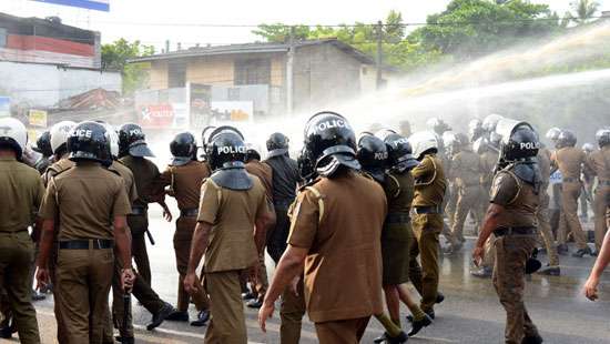 Tear gas, water cannons used to disperse uni students