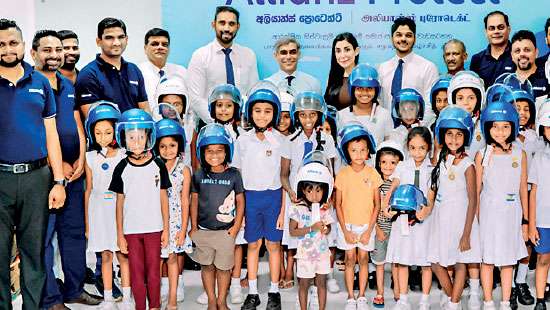 Allianz Lanka expands ‘Allianz Protect’ with the distribution of child safety helmets