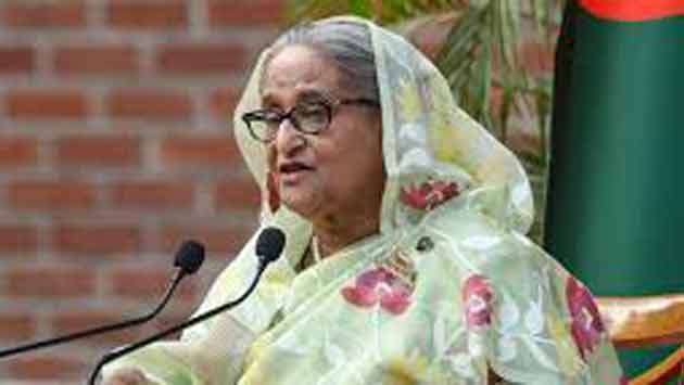 Bangladesh court issues arrest warrant for ex-prime minister