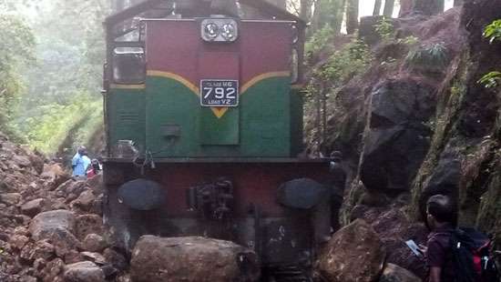 Rocks fall on train