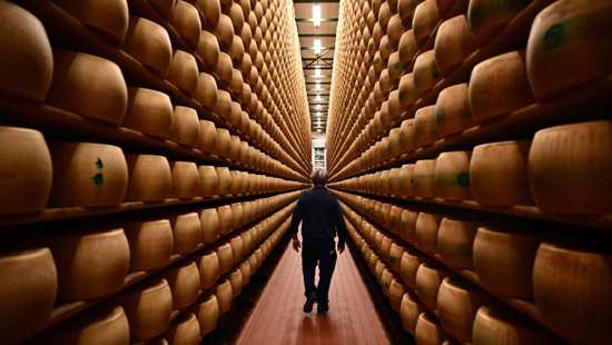 Italian man crushed to death by falling cheese wheels