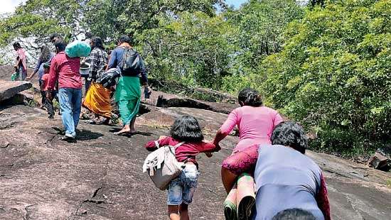 Could the incumbent  govt. resolve  deep-rooted land conflicts  in the North and East?