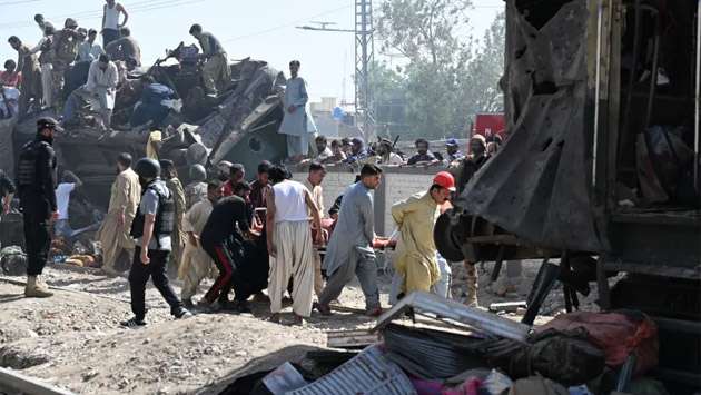Suicide car bomb attack on train in Pakistan kills at least 24