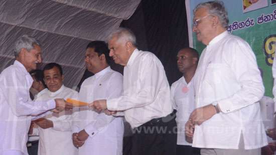 PM distributes land deeds