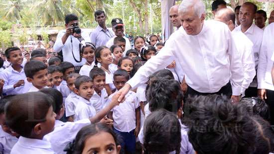 PM extends hand to kids