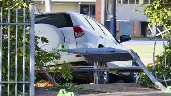 Boy dies, three injured as car crashes into Melbourne school