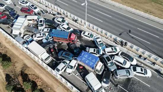 One person killed as 200 vehicles collide in fog on Chinese bridge