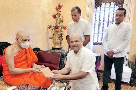 Milinda Moragoda presented first copies of ‘Ashoka Vadana’ to Mahanayake Theras