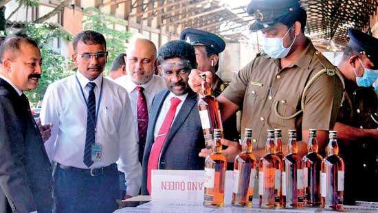 Customs seize Rs.60Mn worth booze, fags, cosmetics sent from abroad
