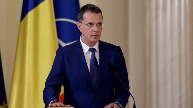 Romania’s defense minister resigns over false claims on his CV