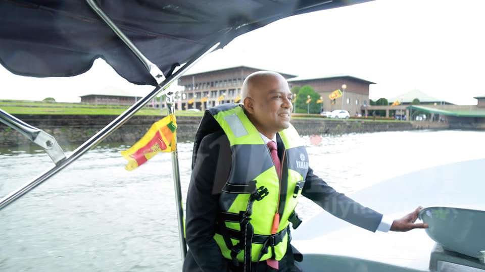 MP Vithanage takes boat to parliament