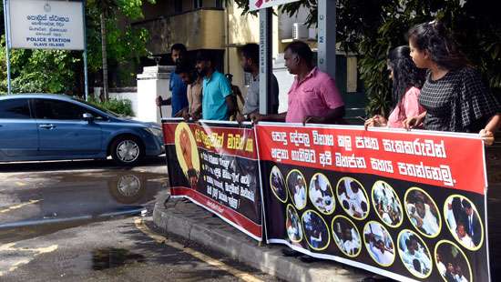 Silent protest near Slave Island Police station