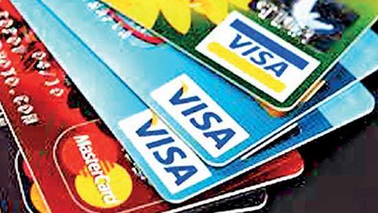 January credit card balance slips as cardholders turn cautious on spending