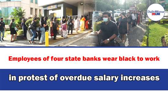 Employees of four state banks wear black to work in protest of overdue salary increases