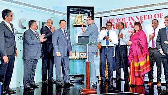 HNB marks 50th AGM opening market trading at CSE