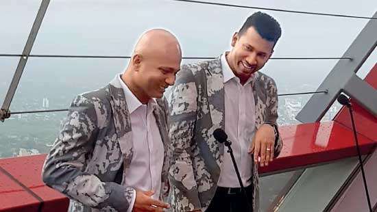 The De Lanerolle Brothers perform from the Lotus Tower