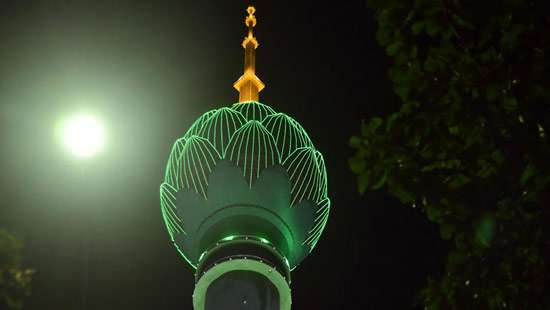 Lotus tower lights up