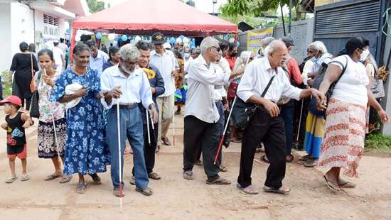 Program held to mark White Cane Day