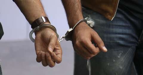 Five arrested with firearms for threatening, attacking prison officer in front of his mother, sister