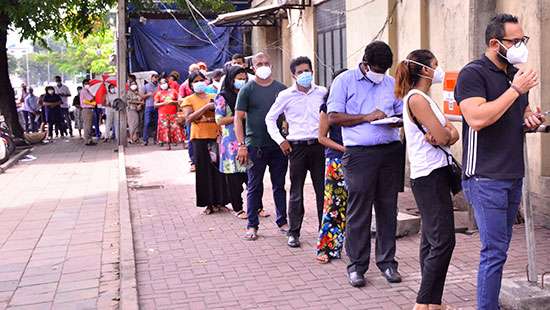 People queuing to get Sinopharm vaccine