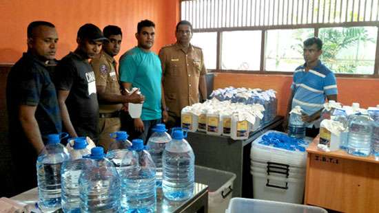 Chinese woman nabbed with illicit liquor