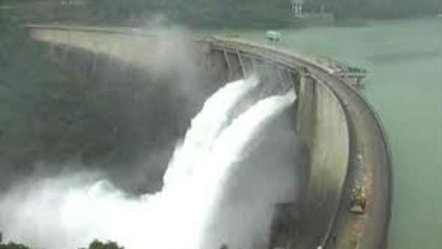 Two reservoir sluice gates opened