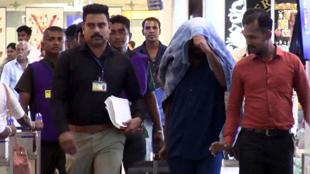 Triple murder suspect arrested at BIA while fleeing to Dubai
