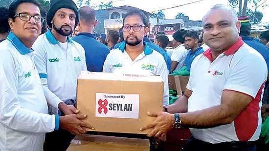 Seylan Bank joins hands with ‘Samanolasiri Haritha Wandana’ project at Sri Pada