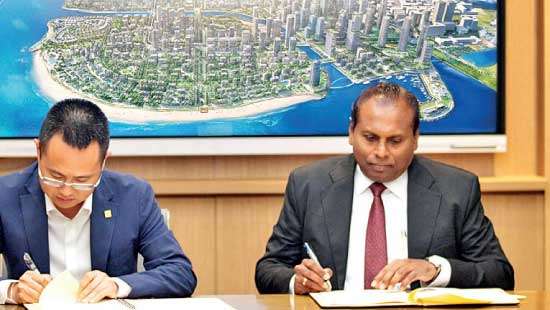 Sampath Bank signs landmark agreement for Port City Colombo Branch