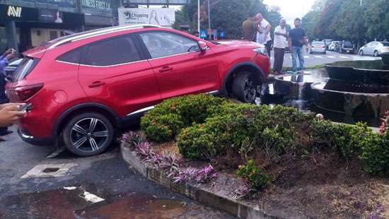Luxury vehicle runs over policeman