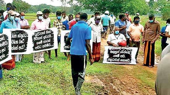 Reopening of the Yakkure - Manampitiya road Silent villagers spurred on by  arrogant minister