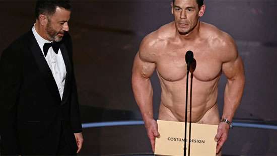 John Cena gives out costume design Oscar in his ‘birthday suit’