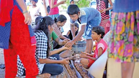 Green-fingered children launch ‘seed balls’ project in Kudathanai