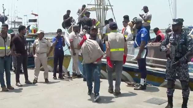 Navy brings ashore two boats carrying drugs, weapons