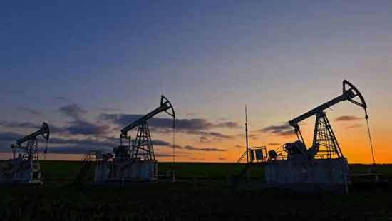 Oil prices rise and stocks slip after weekend of turmoil in Russia