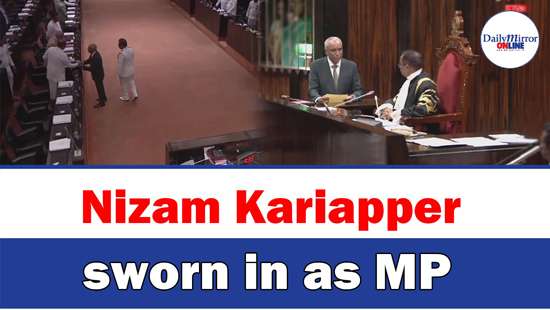 Nizam Kariapper sworn in as MP