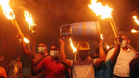 Torch light protest by SJB