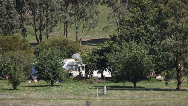 Australian police fatally shoot suspect in 3-hour standoff after 2 officers killed