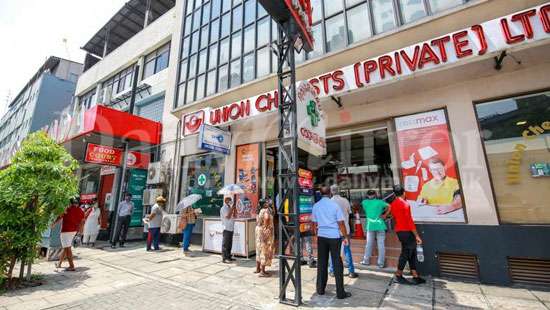 Lengthy queues at pharmacies