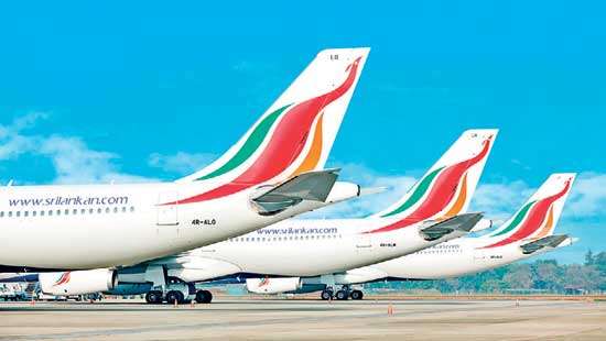 SriLankan cuts losses in first half